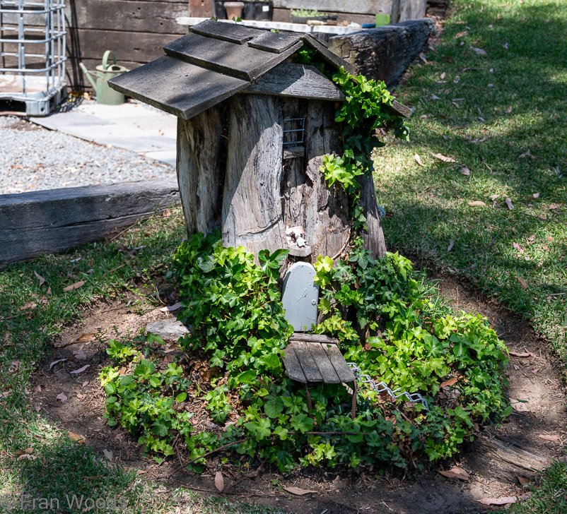 Stump house for fairies at garden 4